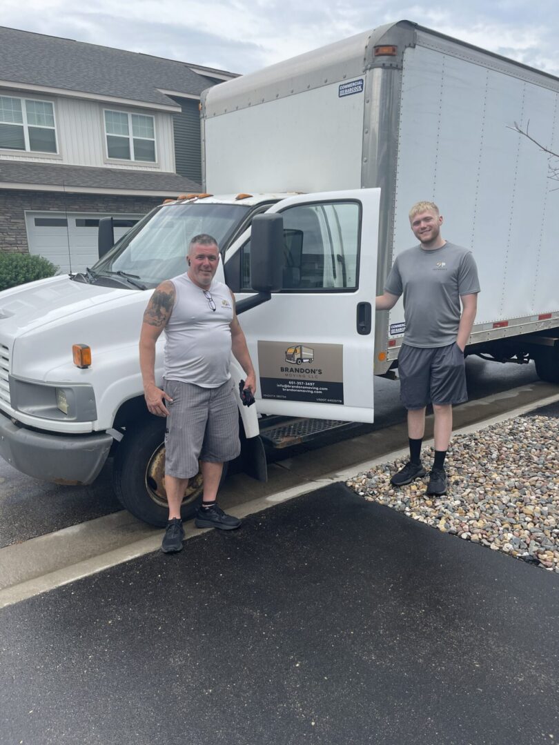 Owner and Son with Moving Truck